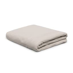 A folded blanket in a soft beige colour, featuring a textured fabric and a subtle logo.