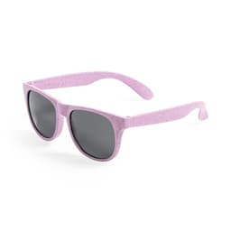 A pair of light pink sunglasses with dark lenses, featuring a subtle speckled design and a logo on the side.