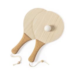 Two wooden beach rackets in a natural finish with cork handles, accompanied by a white ball.