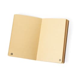 A beige notebook with blank recycled pages and a small logo in the bottom corners.