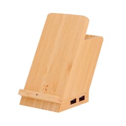 A bamboo phone stand features a slanted design with multiple USB ports for charging. It has a natural wood finish.