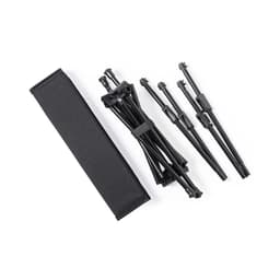 A black barbecue set featuring folding supports and a storage bag. Includes multiple detachable components.