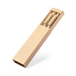 A brown cardboard box containing two wooden pens. The box has a simple, minimalist design and features a logo.