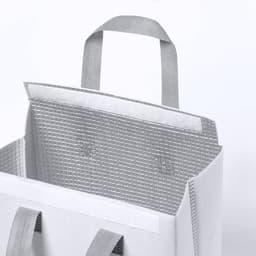 A grey cooler bag with solid grey handles, featuring an insulated interior and an open top.