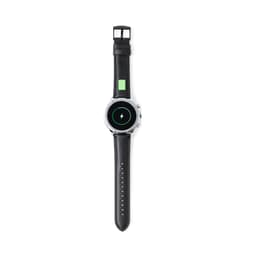 A black smartwatch with a round face and a sleek design, featuring a charging indicator.