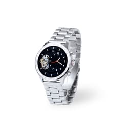 A silver wristwatch with a black dial, featuring visible gears and a metal bracelet. It includes a logo on the dial.