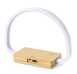 A wireless charger lamp featuring a bamboo base and a white, curved plastic arch.