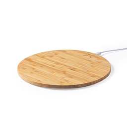 A round bamboo wireless charger with a white charging cable attached. The surface has a natural wood finish.