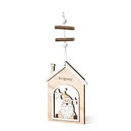 A wooden hanging decoration in the shape of a house, featuring a Santa design, with a natural wood finish and white accents.