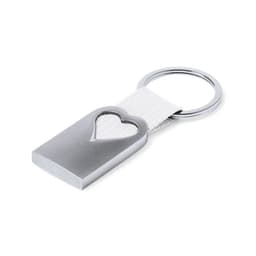 A silver keyring with a heart-shaped cutout and a white fabric strap. It features a metallic finish and a logo.
