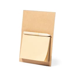 A brown cardboard notepad holder with a yellow sticky note pad and a pen on top.