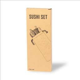 A sushi set in a cardboard packaging featuring chopsticks and utensils, with a simple illustration on the front.