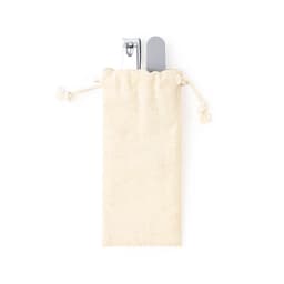 A cream-coloured drawstring pouch containing a silver nail clipper and a grey nail file. The pouch has a simple, natural look.