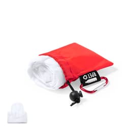 A red poncho neatly packed in a compact pouch, featuring a carabiner and a drawstring closure.