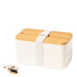 A white lunch box with a bamboo lid, featuring a strap and small accessories. The design is minimalistic and modern.