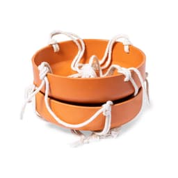 Two orange outdoor bowls with white rope handles, stacked on top of each other.