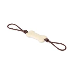 A bone-shaped dog chew toy in cream colour, featuring brown knotted ropes at each end.
