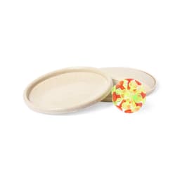 A set of two beige frisbees and a colourful ball with bright yellow and orange patterns.
