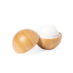 A bamboo lip balm container with a white balm. The lid is off, revealing the smooth balm inside.