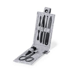 A grooming kit featuring black tools and a grey felt holder, including scissors, files, and tweezers.