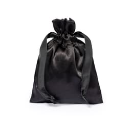 A black satin drawstring bag with matching straps, featuring a smooth, shiny surface.