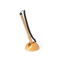 A wooden pen in a natural finish, housed in a circular base with a coiled cord attached.
