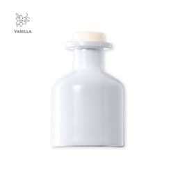 A white aromatic diffuser with a round base and a plain top, featuring a floral logo.
