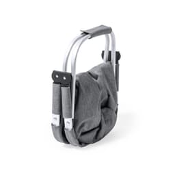 A grey bag with a folding design and white handles, featuring a logo on the side.