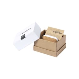 A white and brown box containing Crawly Earphones, with a card indicating it’s a limited edition product.