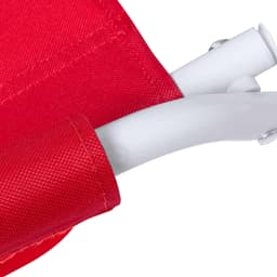 A close-up of a red fabric cover with white metal supports, part of the Coswel Chair. It features a logo.