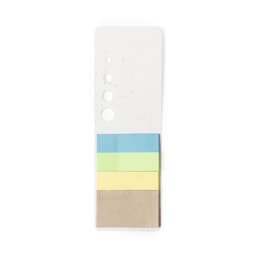 A stack of sticky notes in blue, green, yellow, and brown on a white backing, featuring a logo.