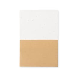 A Zomek notebook featuring a white top section and a brown kraft bottom, with a logo at the top.