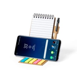 A notebook with a spiral spine, sticky note flags in various colours, and a pen, alongside a smartphone.
