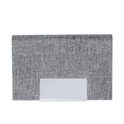 A grey fabric business card holder with a silver metal accent. The holder features a plain surface and a branding logo.