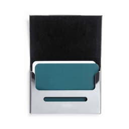 A teal business card holder with a sleek metallic finish, presented in an open black box.