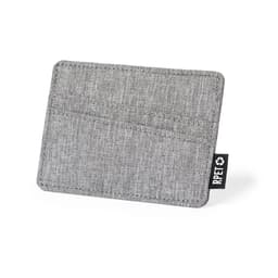 A grey business card holder with a textured fabric finish and a logo tag.