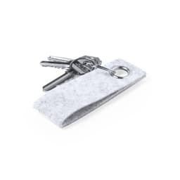 A grey felt keyring with a metal ring, featuring several silver keys attached.