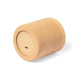 A cylindrical Bluetooth speaker in a cork finish with a light-coloured base and subtle control buttons.