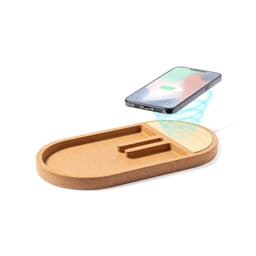 A wireless charger in a cork design, featuring slots for a phone and a cable, with a smartphone hovering above it.