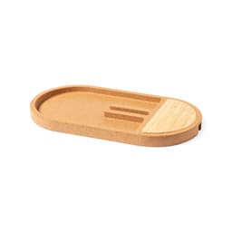 A cork and wood charging tray with an oval shape, featuring grooves for holding devices. It has a natural finish.