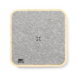 A wireless charger with a textured grey surface and a bamboo base, featuring a small logo.