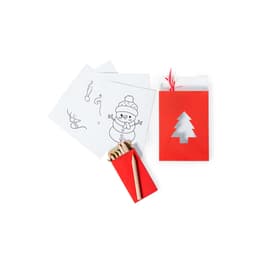 A red gift bag with a tree cutout, containing coloured pencils and several black and white activity sheets.