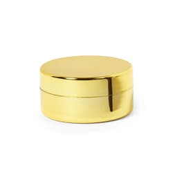 A shiny gold lip balm container with a smooth, reflective surface and a round shape. It has a lid and is simple in design.