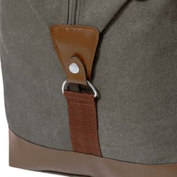 A green bag with brown accents, featuring a leather tab and metal fastening. It has a structured design and a logo.