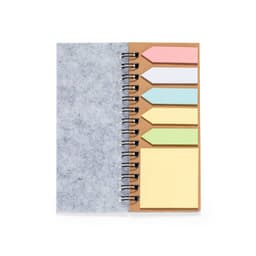 Aurat Notebook featuring a grey cover with various sticky note flags in pink, white, blue, green, and yellow.