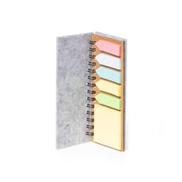 Aurat Notebook with grey cover and five assorted sticky note flags in pink, white, green, and yellow.