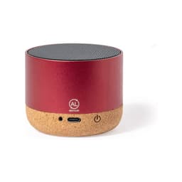 A round red Bluetooth speaker with a cork base and a mesh top. It features a logo and a USB-C port.