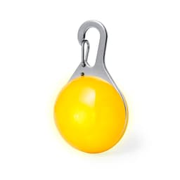 A yellow security light with a metallic hook for attachment. It has a smooth, round design.