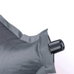 A grey Balum Pillow with a black valve, designed for outdoor leisure activities. It features a logo.