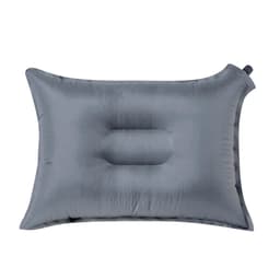 A grey inflatable pillow with a central indentation, featuring a valve for inflation. It has a smooth, glossy finish.